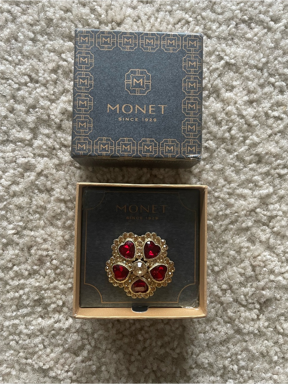 Monet Gold-Tone Brooch with Red Heart Stones and Clear Center